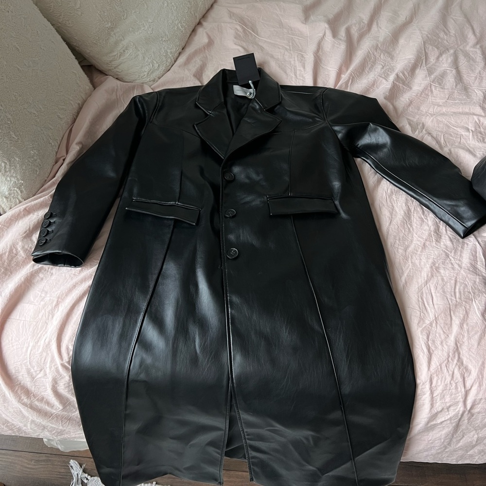 Faux leather coat. Brand new